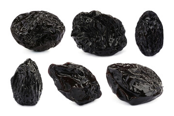 Set with sweet dried prunes on white background