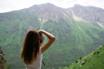 woman photographer travel mountains nature adventure landscape