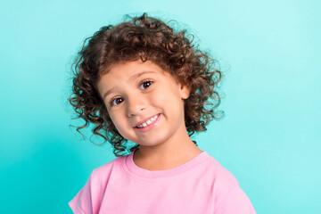 Portrait of attractive cheerful wavy-haired girl posing good mood isolated over bright teal...