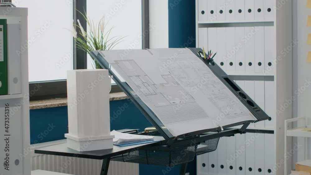 Poster close up of blueprints plan and building model on table in empty space used for construction and arc