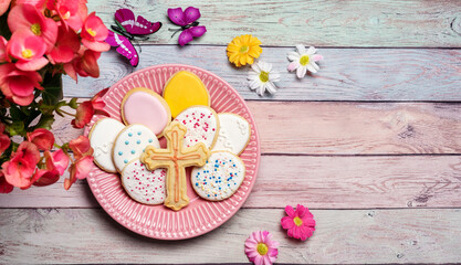 Easter sugar cookies Cookies eggs, cross, flowers on pastel background. Top view