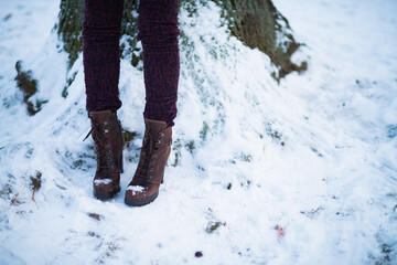 Closeup on female outdoors in city park in winter