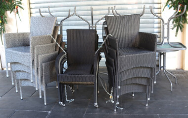 stacked and chained chairs