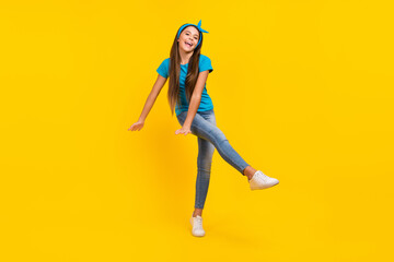 Fototapeta na wymiar Full body photo of young pretty girl have fun dance playful carefree disco isolated over yellow color background