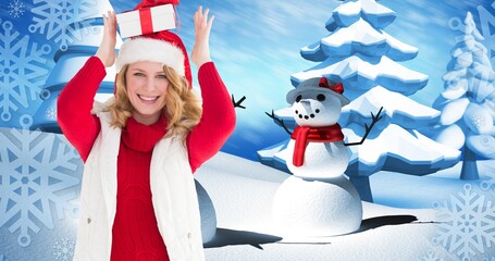 Composition of happy woman in santa hat carrying gift with snowman in background, copy space
