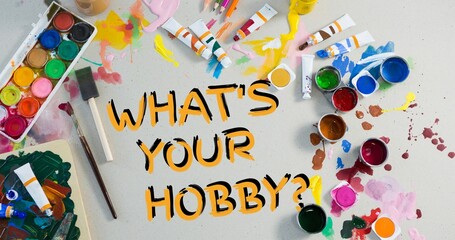 Composition of what's your hobby text with various art supplies and paints on table