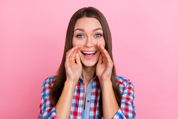 Photo of cunning brunette young lady arms lips say wear blue shirt isolated on pastel pink color...