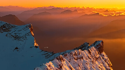 Beautiful alpine sunset view at the famous Zugspitze summit, top of germany, near Ehrwald, Tyrol, Austria and Garmisch-Partenkirchen, Bavaria, Germany