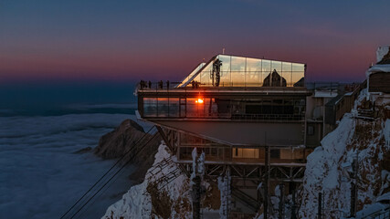 Beautiful alpine sunset view at the famous Zugspitze summit, top of germany, near Ehrwald, Tyrol, Austria and Garmisch-Partenkirchen, Bavaria, Germany