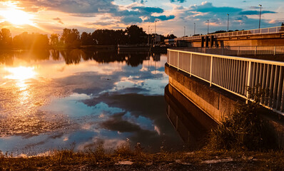 Beautiful sunset with reflections near Plattling, Isar, Bavaria, Germany