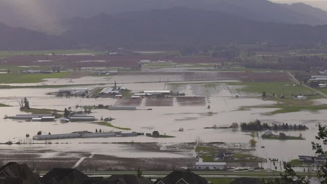 Devastating Flood Natural Disaster in the city and farmland after storm. Abbotsford, Greater Vancouver, British Columbia, Canada
