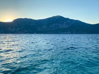 Sunset from Kaena Point on the west coast of Oahu, Hawaii on a cloudy day
