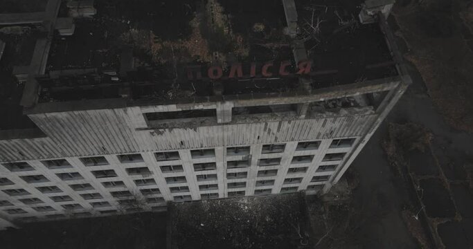 Aerial view of Abandoned Hotel Polissya of Pripyat near the Chernobyl nuclear power plant in Chernobyl exclusion zone. Ukraine. Ghost city after disaster