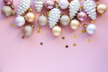 Christmas toys on a pink background. Christmas, new year concept.