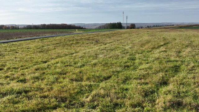 Aerial view of mobile network antennas in France countryside.