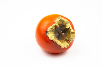 Persimmon close-up isolated on a white background.