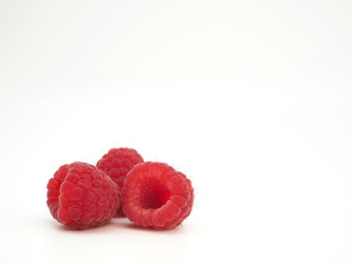 Raspberry berries isolated on white background. Close-up