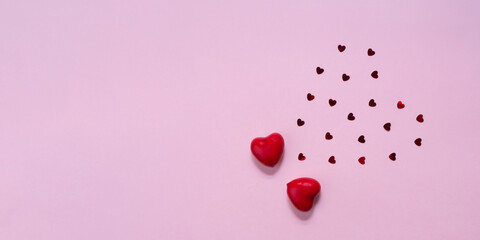 Love emotion. Hearts confetti and two red hearts. Valentines day concept. Copy space. Flat lay