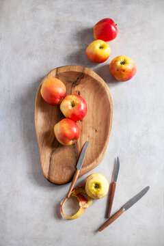 Fresh apples in a wooden bowl