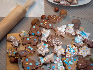 Various Christmas cookies on a Christmas background.