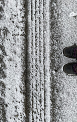 A tire track in the snow.