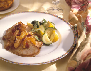 sliced pork with oranges