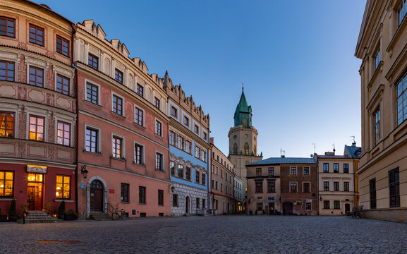 Lublin, Poland - October 31, 2021: A picture of the Old Town Market Square and the Trynitarska Tower, at sunset.