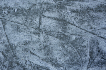 Blue ice in skate scratches, close up view