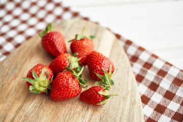 fresh strawberries on wooden board fruit vitamins summer