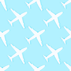 White plane silhouette repeat seamless pattern on light blue background.