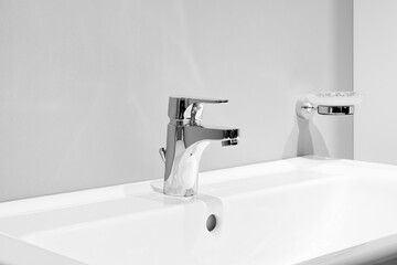 Modern bathroom interior, clean bright stylish designer modern bathroom in gray tone