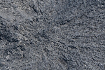Background, texture of stone. Smooth stone surface, gray.