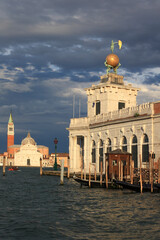 Naklejka premium Dogana da Mar, behind the Isola di San Giorgio with San Giorgio Maggiore; Venice, Veneto; Italy; Europe;