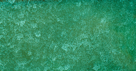 Green dirty glass with hard water stains abstract background