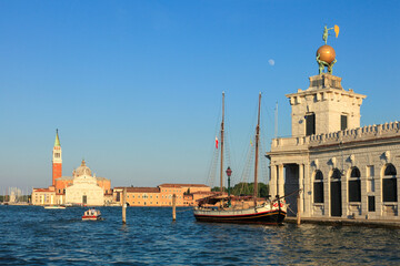 Fototapeta na wymiar Dogana da Mer, behind the Isola di San Giorgio with San Giorgio Maggiore; Venice, Veneto; Italy; Europe;
