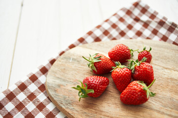 fresh strawberries on wooden board fruit vitamins summer