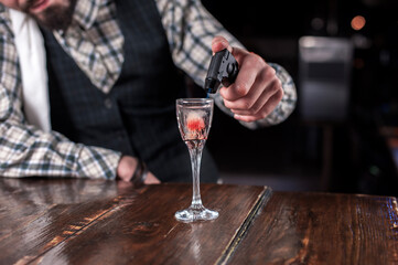 Bartender makes a cocktail at the brasserie