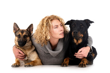 woman, gray german shepherd and beauceron