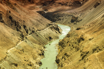 Zanskar river flowing through rocks of Ladakh, Jammu and Kashmir, Ladakh, India