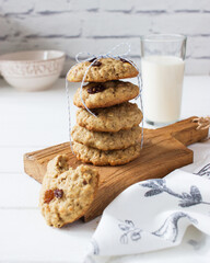 Oatmeal cookies raisin milk.