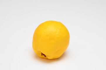 yellow quince fruit on white background