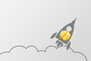 Rocket sketch drawing cartoon with crumpled paper ball on background. Successful business startup.