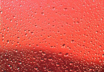 beautiful background of water drops on the glass from the rain