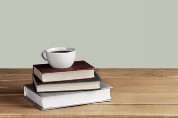 Home office workspace with coffee cup, and book