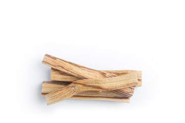 Palo Santo bars close-up and copy space. Ritual cleansing with sacred ibiocai, meditation, aromatherapy with incense and candles..