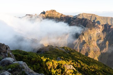 Mountain trail Pico do Arieiro, Madeira Island, Portugal
Scenic view of steep and beautiful mountains during sunrise.