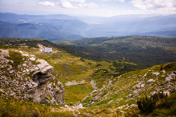Fototapeta na wymiar Beautiful landscape of a hill in Rila mountain, Bulgaria. Warm sunny autumn day. Famous hiking trail in Bulgaria. High quality photo