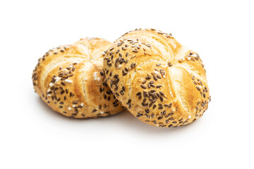 Four baked french buns with seeds