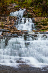 Obraz premium Photo of waterfalls captured by using slow shutter technic to create motion blur effect to waterfall