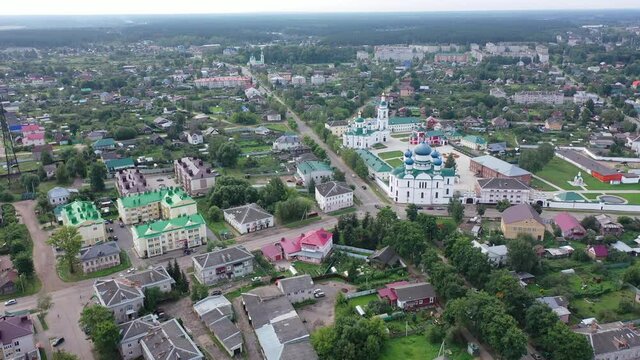 View from drone of architectural complex of Epiphany Monastery, Orthodox convent with cathedrals in center of Russian city of Uglich on summer day, Yaroslavl region . High quality 4k footage